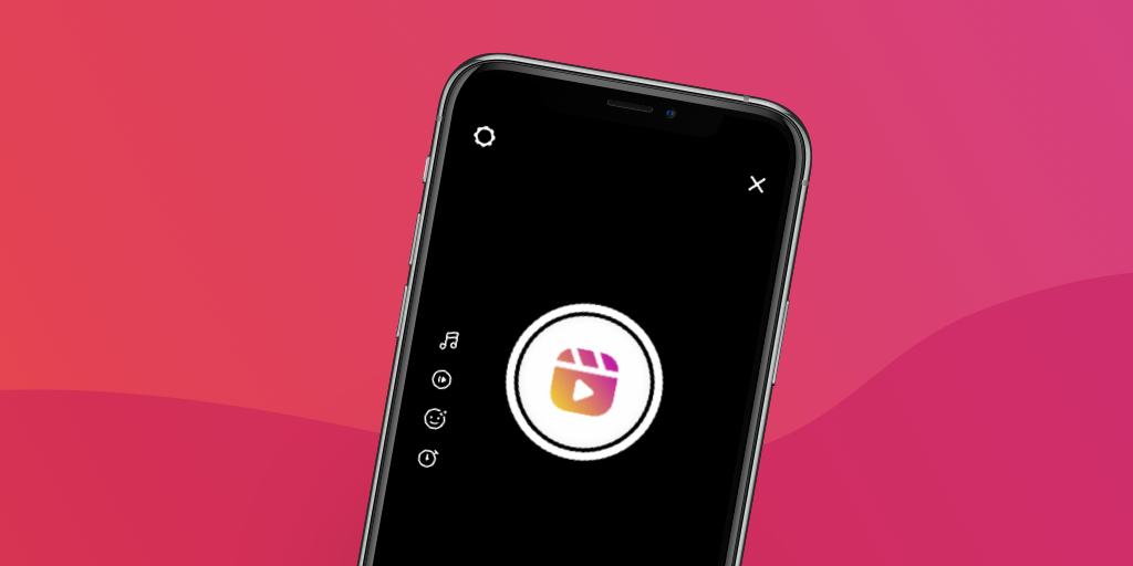 Foto del telefono con logo Instagram Reels su sfondo rosa