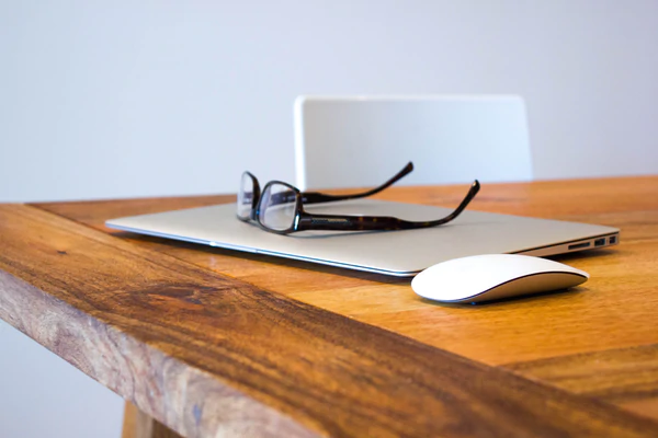 glasses laptop desk