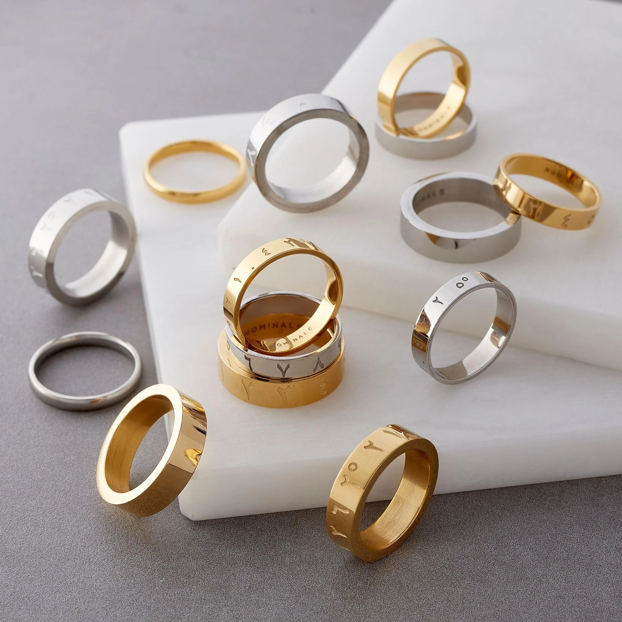 A selection of rings from Nominal in gold and silver.