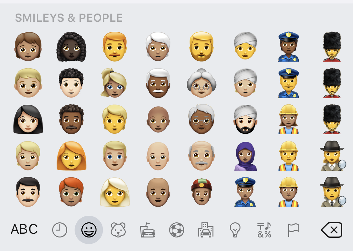 iOSでのSmileys＆People絵文字のスクリーンショット。
