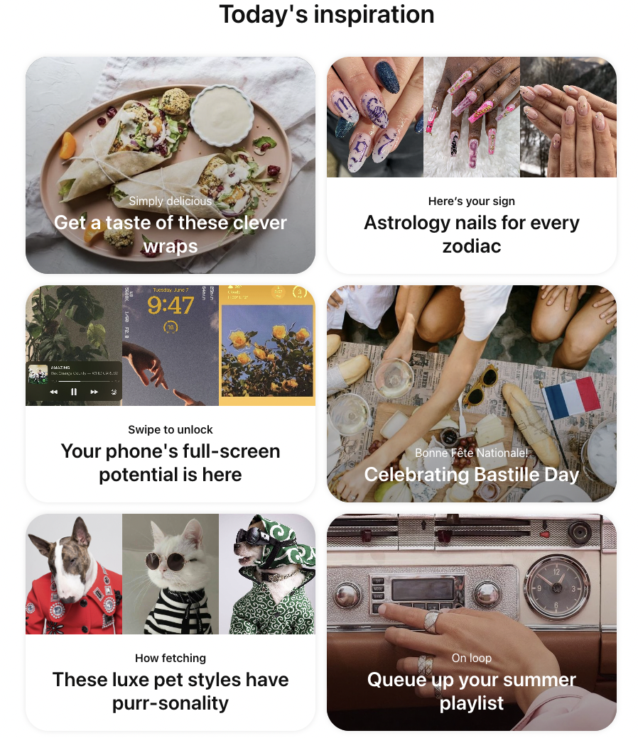 Una captura de pantalla de "Inspiración de hoy" en Pinterest. La página incluye seis imágenes con texto superpuesto. "Prueba estas envolturas inteligentes" sobre una imagen de una envoltura vegetal, "Uñas de astrología para cada zodíaco" sobre una imagen de diseños de arte de uñas en color inspirados en la astrología, "El potencial de pantalla completa de tu teléfono está aquí" sobre una imagen de candado -opciones de pantalla, "Celebrando el Día de la Bastilla" sobre una imagen de personas comiendo una tabla de charcutería con mucho pan francés, "Estos estilos de mascotas de lujo tienen un ronroneo" sobre imágenes caprichosas de gatos y perros vestidos con atuendos humanos y "Hacer cola tu lista de reproducción de verano" sobre una imagen de una persona sintonizando una radio antigua.
