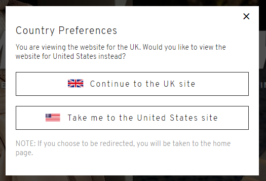 สกรีนช็อตของการตั้งค่าประเทศการตลาดระหว่างประเทศของ Topshop และถามว่าคุณต้องการเยี่ยมชมเว็บไซต์ของประเทศใด: สหราชอาณาจักรหรือสหรัฐอเมริกา