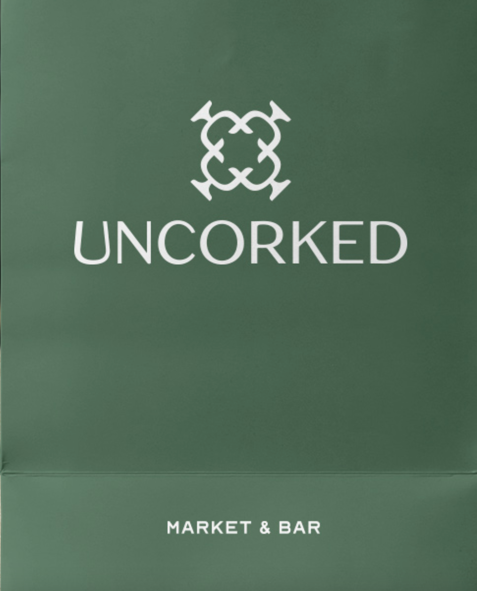 O logotipo da Uncorked é um exemplo de marca com um logotipo simples usando uma forma.