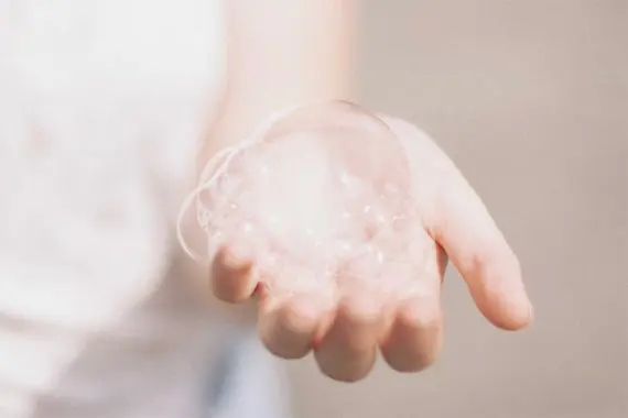 Photo of a hand with liquid soap on it